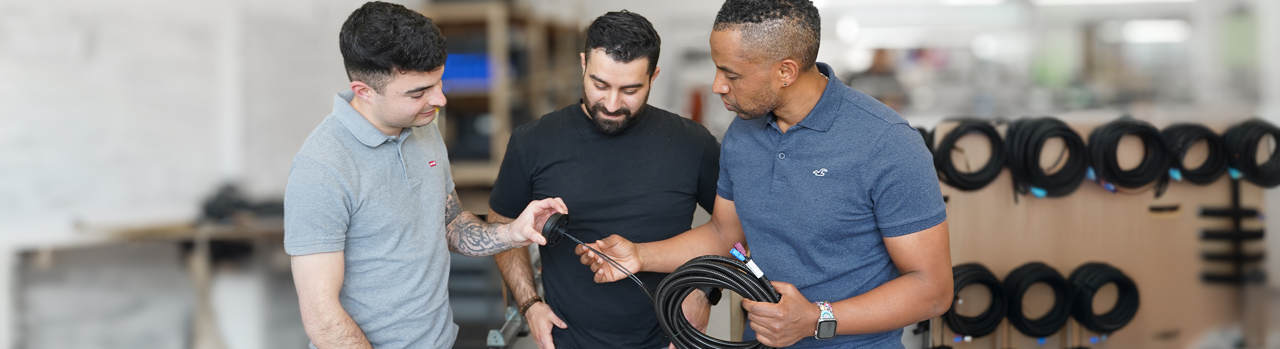 Employees inspect antenna